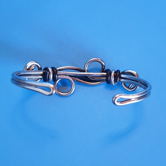 2.5'' Handcrafted Silver Wave Cuff Bracelet with Black Wire Accents Swirl Design - Picture 8 of 11